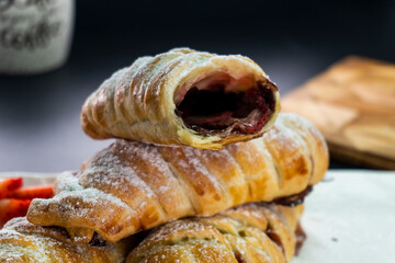 Puff pastry with chocolate and strawberries. Baking. Dessert. Dough.