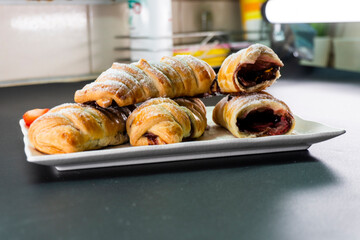 Puff pastry with chocolate and strawberries. Baking. Dessert. Dough.