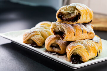 Puff pastry with chocolate and banana. Baking. Dessert. Dough.
