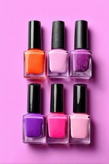 Six colorful nail polish bottles arranged on a vibrant pink background.
