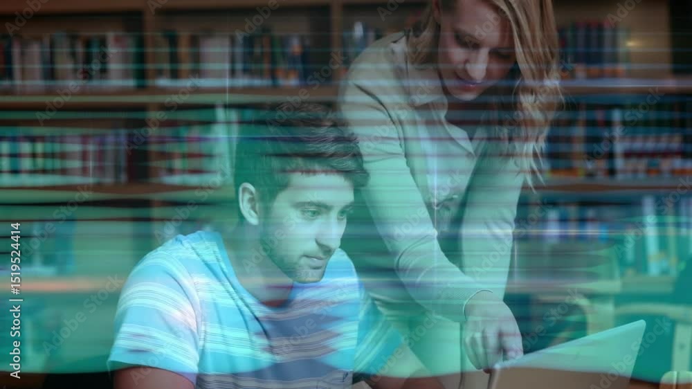 Poster student pausing typing on laptop in university library while peer pointing screen guiding edits