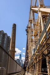 Fototapeta premium Queensboro Bridge and NYC skyline under blue sky