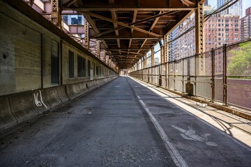 Urban pedestrian pathway under bridge