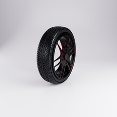 Black and red car wheel 3D render with sport rim isolated on white