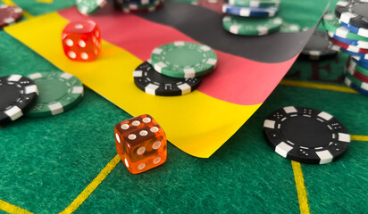 Chips from casino. germany flag. Gambling industry in germany. Casino chips are scattered on steel. Gambling business. Casinos. Gambling. Poker, roulette. 