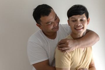Asian male gay couples with intimate relationship enjoy freedom life, LGBT concept