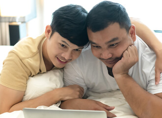Asian male gay couples with intimate relationship enjoy freedom life, LGBT concept