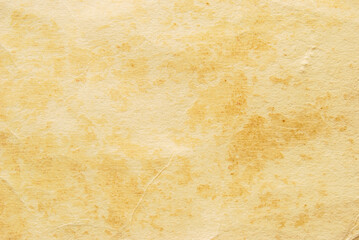 A sheet of rough brown glued cardboard texture as background