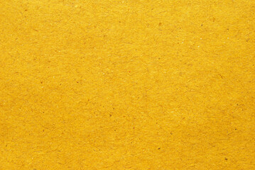 A sheet of yellow recycled paper texture as background