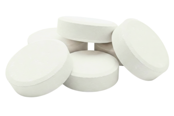 White cleaning tablets stacked for easy household use isolated on a transparent background