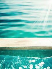 view of an infinity pool blending seamlessly into the ocean — bright turquoise water, clear summer skies, minimalist composition with copy space. Tropical summer vibes mockup background