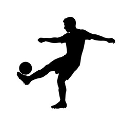 Soccer player silhouette kicking ball