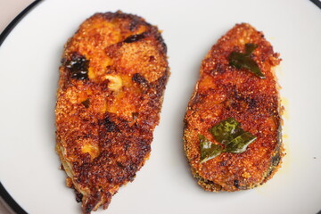 Indian fish fry, Basa or Pangasius, pan fried, marinated with spices
