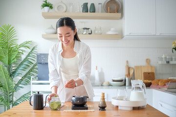 Traditional matcha tea preparation process captured in detail, featuring healthy lifestyle and mindfulness.