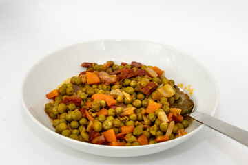 Plate with peas and carrot