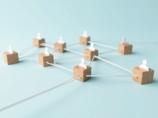 Wooden Cubes Connected with Lines on Blue Background Representing Social Network and Organizational Structure, Illustrating Teamwork, Digital Communication, and Business Collaboration