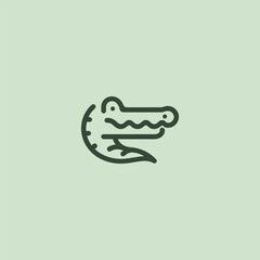 Crocodile logo in clean and minimalist line art design.