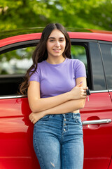 Smiling young teenager holding car keys