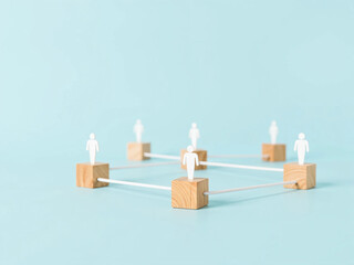 Wooden Cubes Connected with Lines on Blue Background Representing Social Network and Organizational Structure, Illustrating Teamwork, Digital Communication, and Business Collaboration