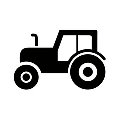 Tractor working in a lush green field during a sunny afternoon in the countryside