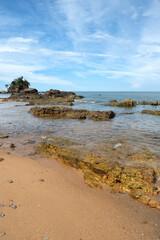 Tranquil Coastal View of Pantai Kuala Kemasik with Rocky Shoreline, Terengganu, Malaysia - This serene coastal scene captures the natural beauty of Pantai Kuala Kemasik in Terengganu, Malaysia.