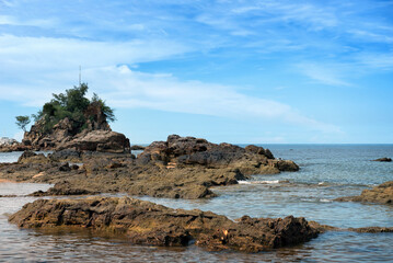 Tranquil Coastal View of Pantai Kuala Kemasik with Rocky Shoreline, Terengganu, Malaysia - This serene coastal scene captures the natural beauty of Pantai Kuala Kemasik in Terengganu, Malaysia.