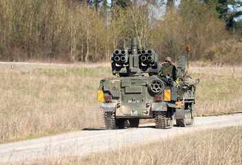a Bulldog FV432 towing a British army Alvis Stormer tank equipped with Starstreak HVM (High Velocity Missile) launcher