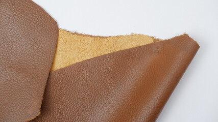 close up photo of genuine dark brown cowhide with orange peel pattern