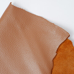 close up photo of genuine dark brown cowhide with orange peel pattern