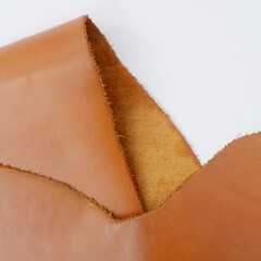 close up photo of genuine brown cowhide