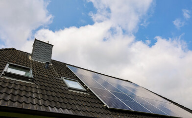 Photovoltaic panels providing green energy on a roof
