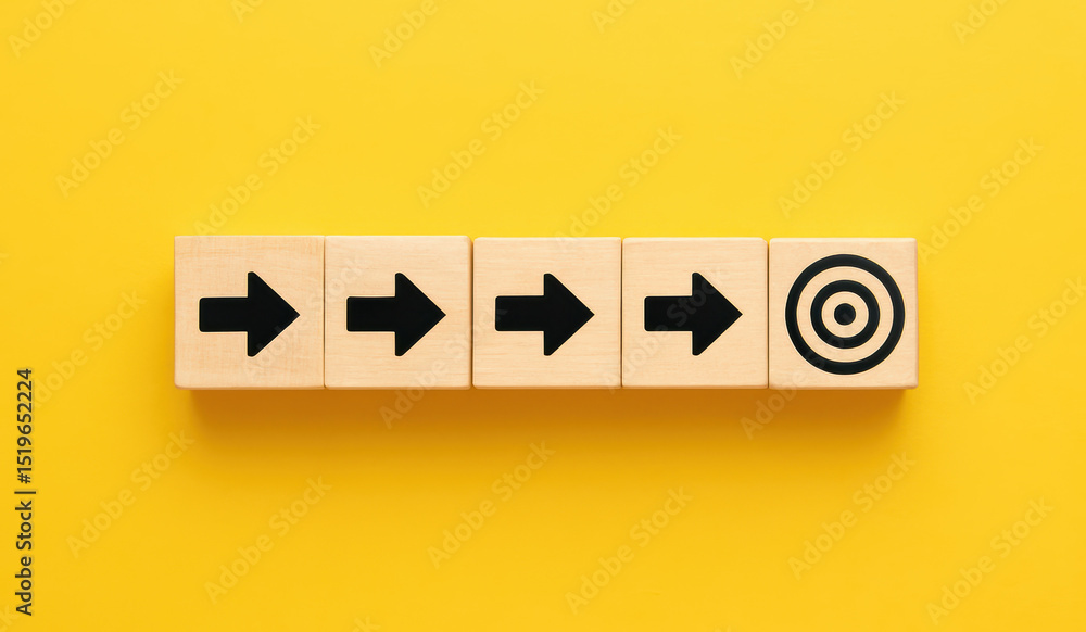 Poster a sequence wooden blocks aligned on a yellow background illustrates focus and progression towards a 