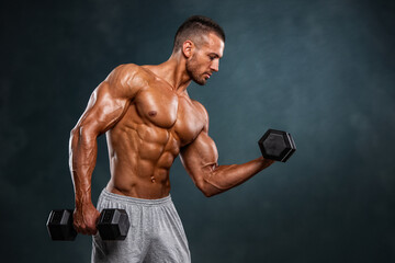 Muscular Young Man Exercise with Weights, Lifting Weights