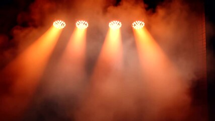 Stage Lights Illuminate Fog in Dramatic Theater Scene