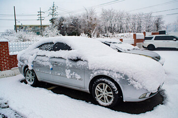 A snowy day, Car covered with ice or snow, in Hasong, South Korea