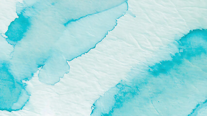 Soft watercolor texture in blue hues with paper grain effect