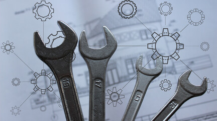 Black Contours of Variety Design Cogwheels over Mechanical Wrenches on Background of Defocused Construction Blueprint 
