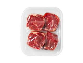 Packaged fresh raw beef steaks in protective plastic tray for storage and preservation on transparent background