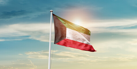 Kuwait national flag waving in beautiful sky with mast. A proud moment flag waving with sunlight.
