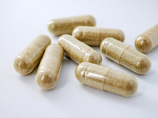 Herbal medicine capsule isolated on white background, Close-up of Herbal medicine capsule