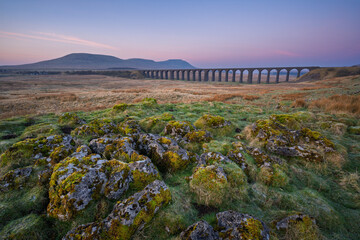 beautiful morning sky over Ribblehead Viaduct in The Yorkshire Dales National Park, UK.