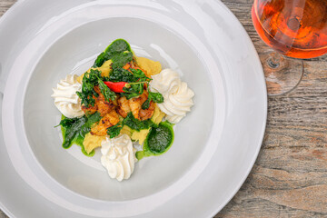 marinated chili prawns on creamy polenta (gluten-free) with ricotta and parsley pesto