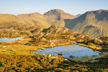 Innominate Tarn in the north of The Lake District National Park with beautiful view of mountains with summer sunshine.
