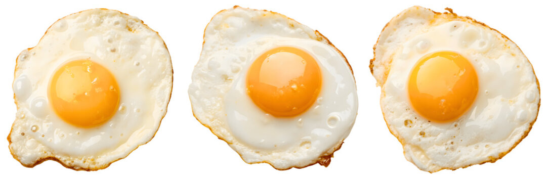 Three fried eggs isolated on transparent background, sunny side up, close up view