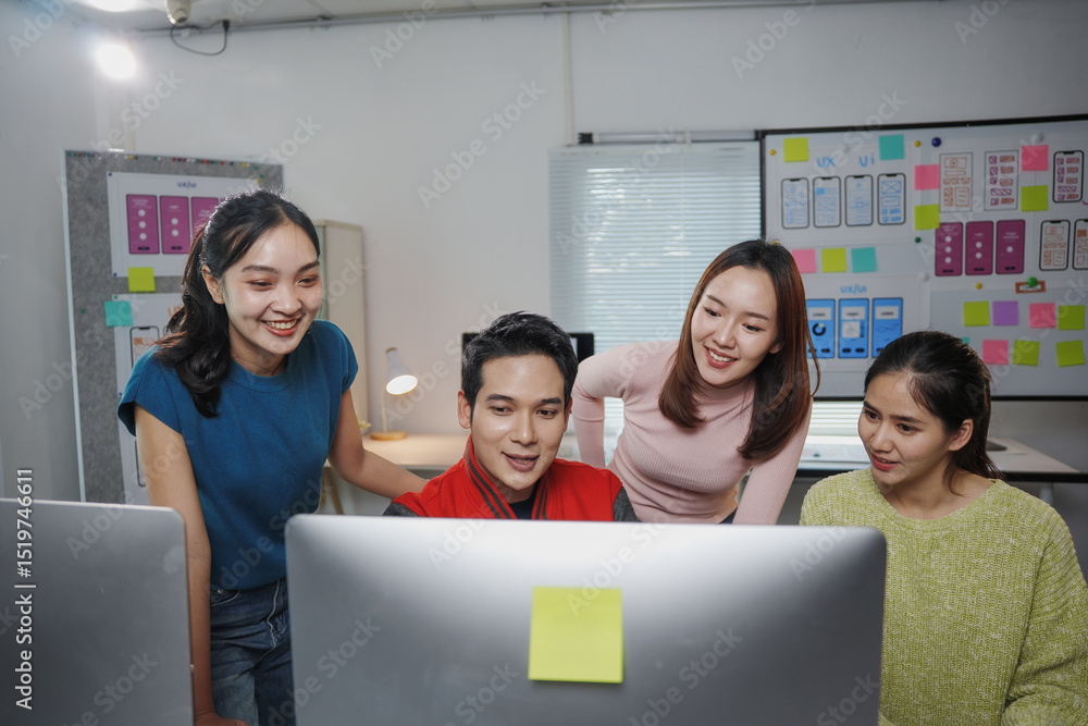 Poster group of young asian uiux designers and developers working together on a new mobile app in the offic