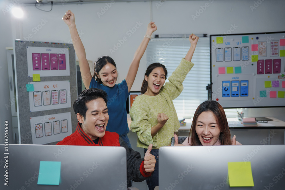 Aufkleber group of young asian user interface and user experience designers celebrating a successful project b