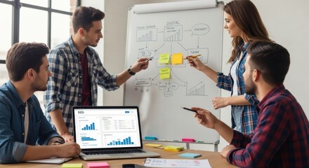 Team discusses SEO strategy at whiteboard in office setting.