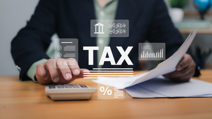 Hands interacting with digital tax interface, calculator, documents. Symbolizes tax system, financial management, online accounting. Ideal for tax preparation, business finance, legal compliance now.