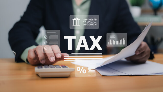 Hands interacting with digital tax interface, calculator, documents. Symbolizes tax system, financial management, online accounting. Ideal for tax preparation, business finance, legal compliance now.