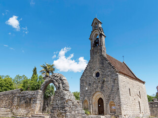 Church Saint-Jean of Hospitalet and arched portal facing the ruins of the old hospital. Reception...
